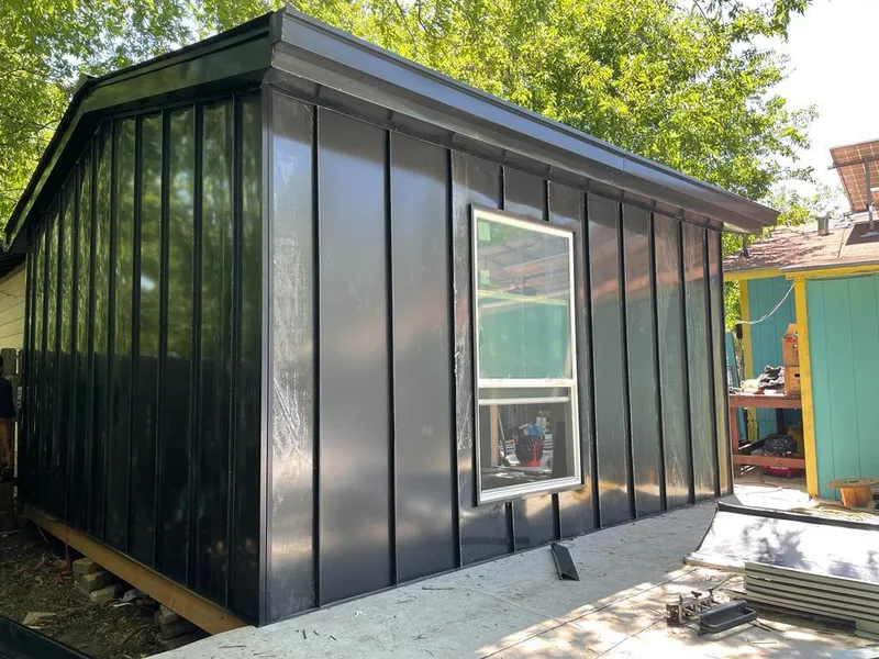 Black standing seam metal wall panels for Roof Inspection in Piedmont