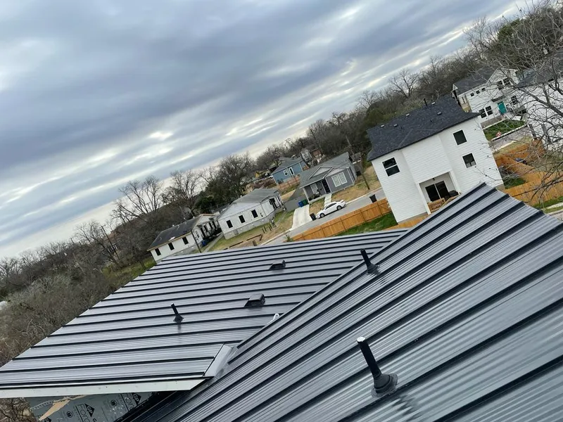Standing seam metal roof panels with vents for Skylight Repair in Piedmont